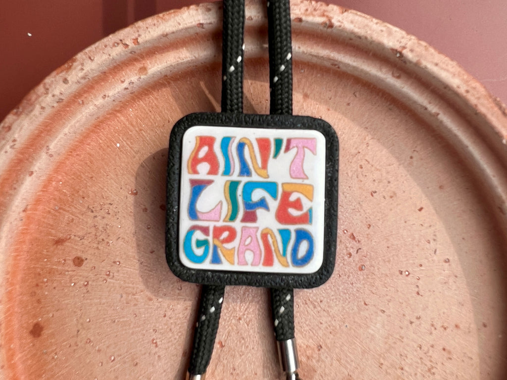 Ain't Life Grand Black Bolo Tie