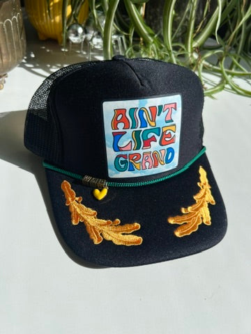 *Limited Edition* Ain't Life Grand Trucker Hats