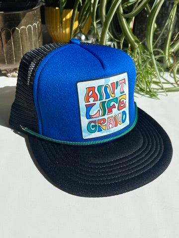*Limited Edition* Ain't Life Grand Trucker Hats